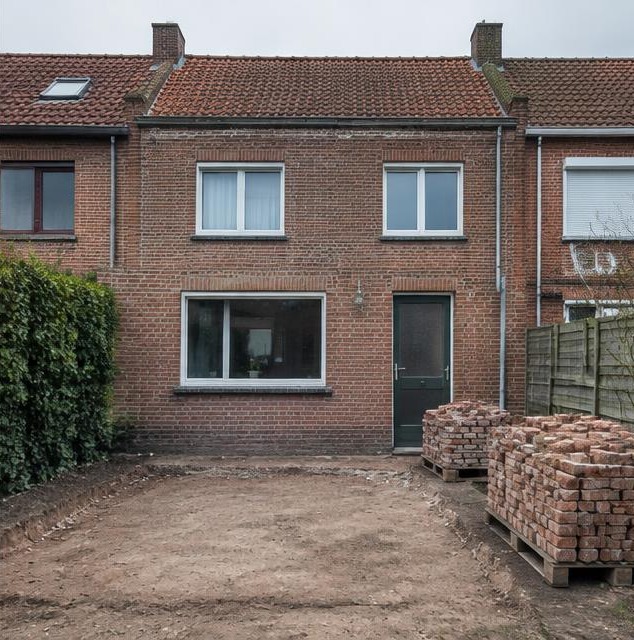 Vrijgemaakte tuinzone met behouden hoofdwoning