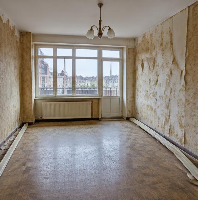 Appartement met oude wand- en vloerafwerking